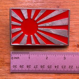 Belt buckle: Japanese rising sun, w/ cobra hatching from egg, and pair of dice.